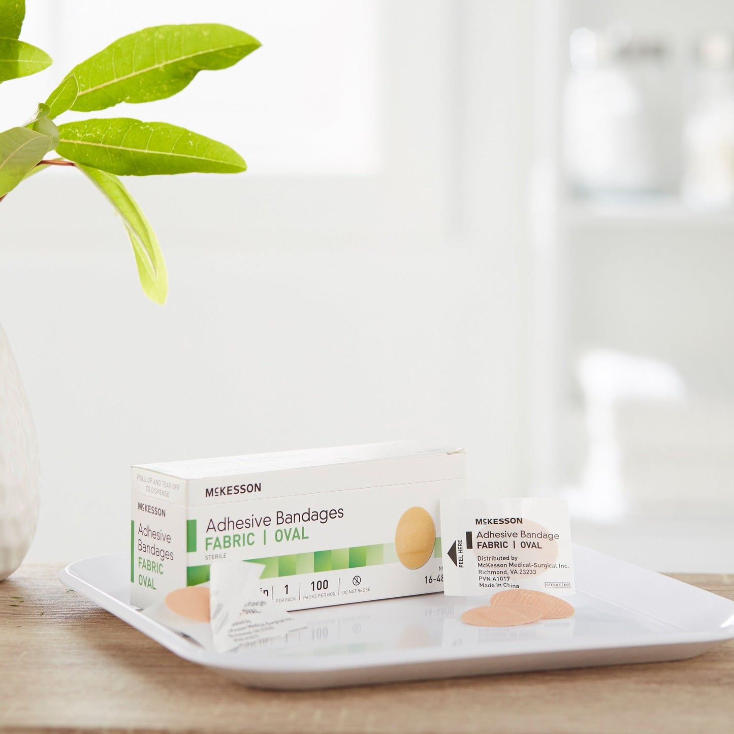 Adhesive Strip McKesson 1 X 1-1/4 Inch Fabric Oval Tan Sterile, Packaging Type- Box