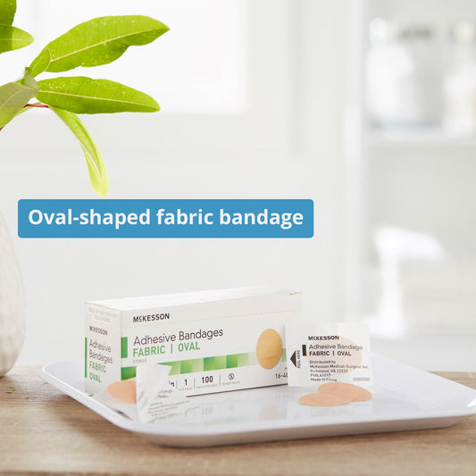 Adhesive Strip McKesson 1 X 1-1/4 Inch Fabric Oval Tan Sterile, Packaging Type- Box