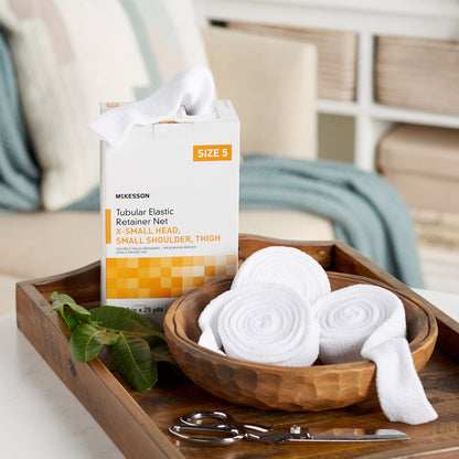 Elastic Net Retainer Dressing McKesson Tubular Elastic 14-1/2 Inch X 25 Yard Size 5 White X-Small Head / Small Shoulder / Thigh NonSterile, Packaging Type- Box