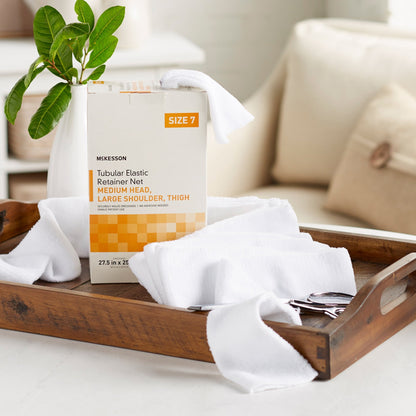 Elastic Net Retainer Dressing McKesson Tubular Elastic 27-1/2 Inch X 25 Yard (69.9 cm X 22.9 m) Size 7 White Medium Head / Large Shoulder / Thigh NonSterile, Packaging Type- Box